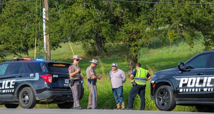 Three people released after witnesses watch cops draw guns on suspects in possession of a stolen vehicle